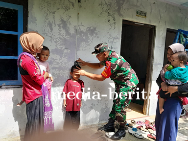 Babinsa Dampingi Posyandu Dan Pemberian Makanan Tambahan
