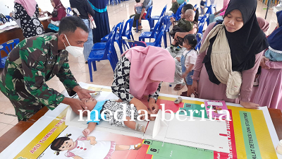 Babinsa Dampingi Posyandu Guna Mewujudkan Balita Sehat